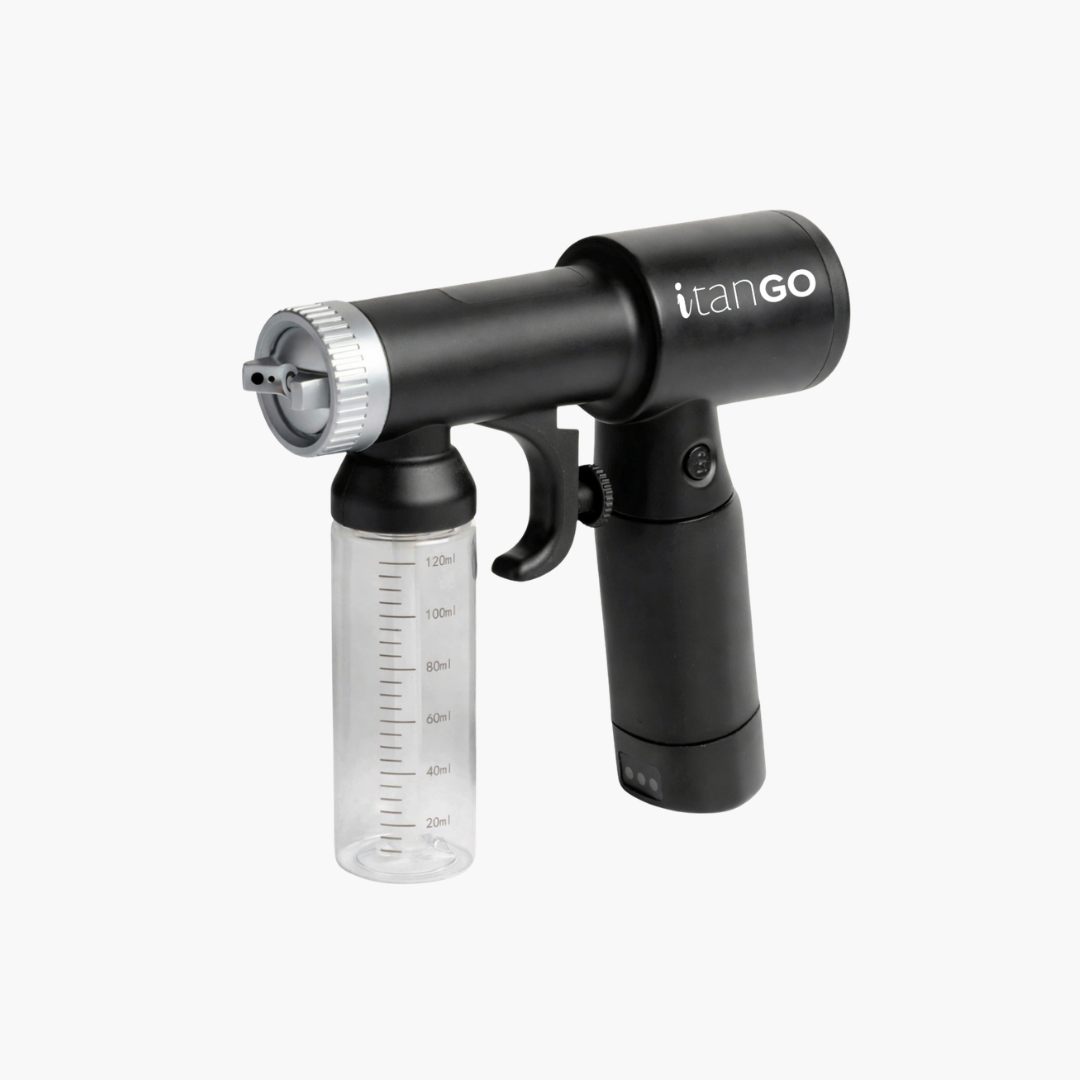 iTan GO portable cordless spray tan gun with refillable solution cup on white background